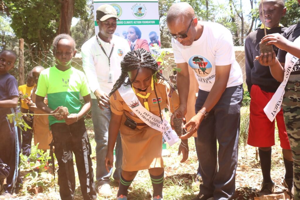 Alice Wanjiru – Green Hummingbird Ambassador with the scout’s movement on a tree planting event